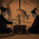A single candle burns softly while Shikamaru and his father play shoji.